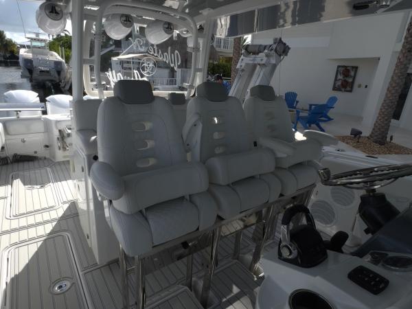 HCB center console diamond-stitch upholstery — before, photo 8 of 9